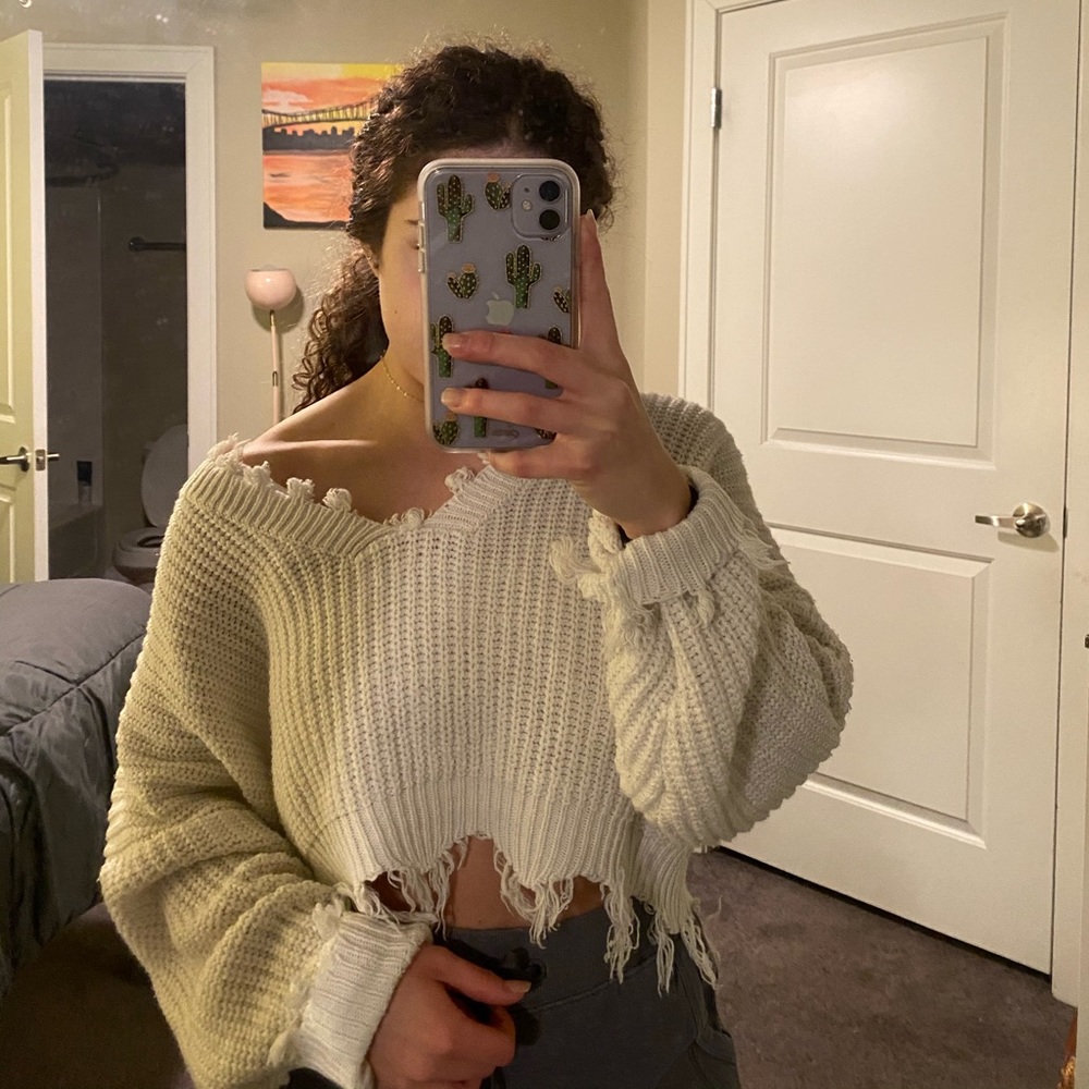 Cropped distressed sweater